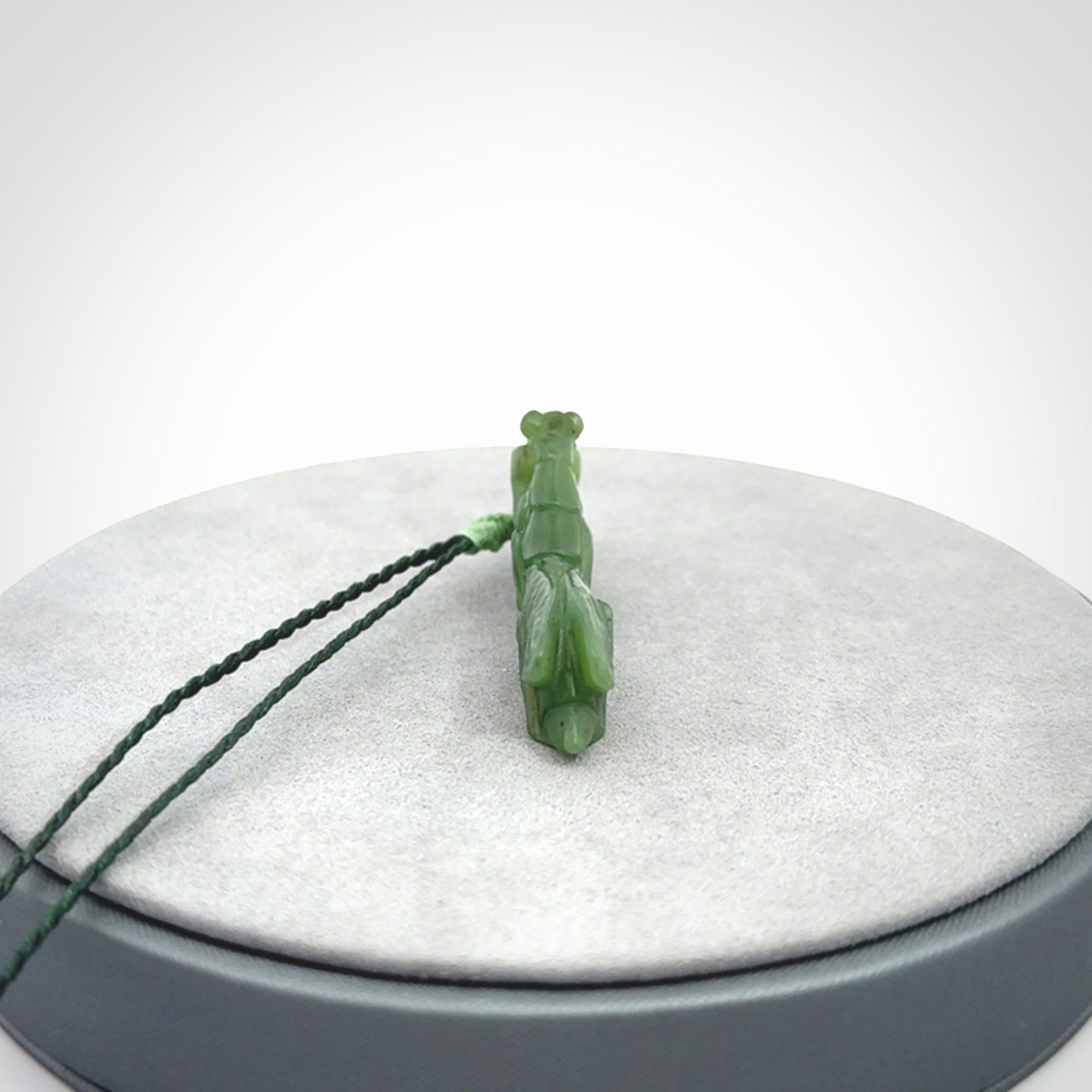 Hand carved Mantis pendant, hand made for us from British Columbian Jade.