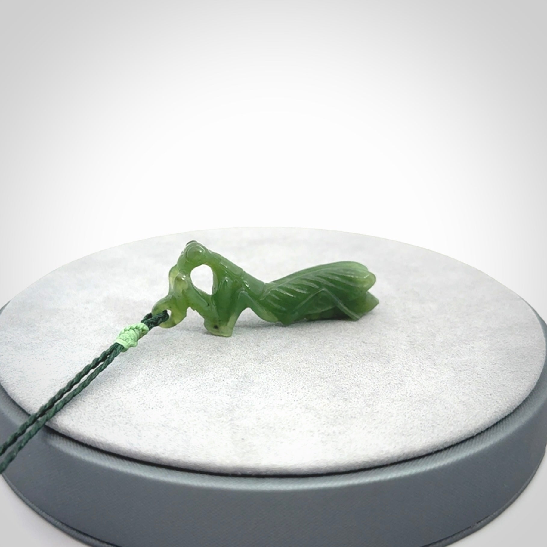 Hand carved Mantis pendant, hand made for us from British Columbian Jade.