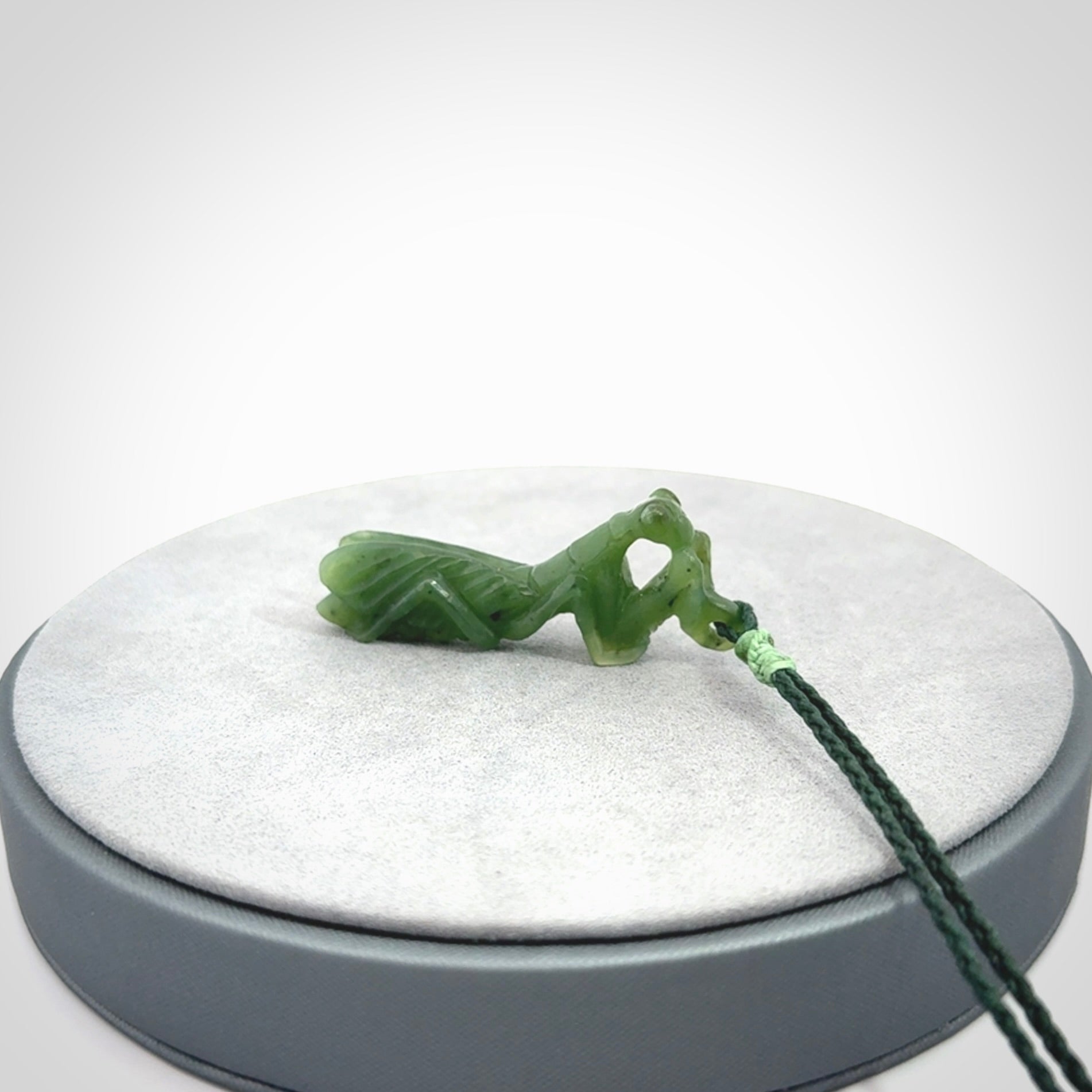 Hand carved Mantis pendant, hand made for us from British Columbian Jade.