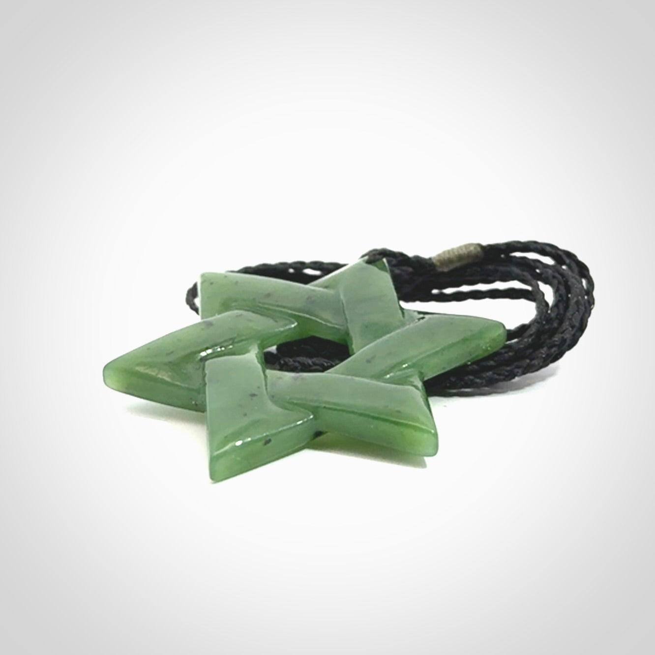 Star of David pendant hand carved from British Columbian Jade. Made by NZ Pacific and for sale worldwide. Postage is included in the price.