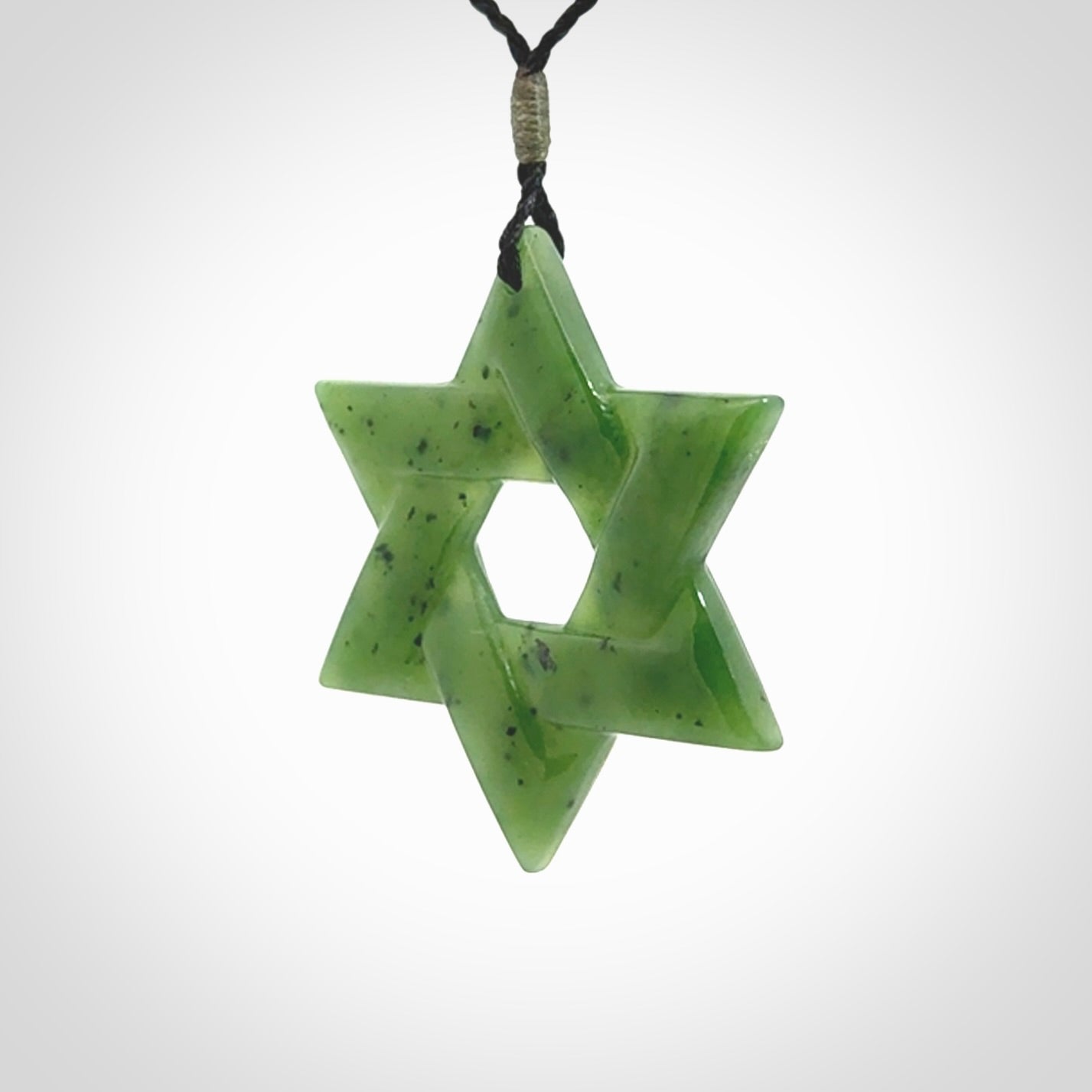 Star of David pendant hand carved from British Columbian Jade. Made by NZ Pacific and for sale worldwide. Postage is included in the price.