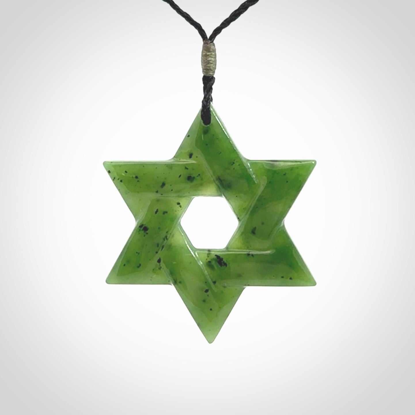 Star of David pendant hand carved from British Columbian Jade. Made by NZ Pacific and for sale worldwide. Postage is included in the price.