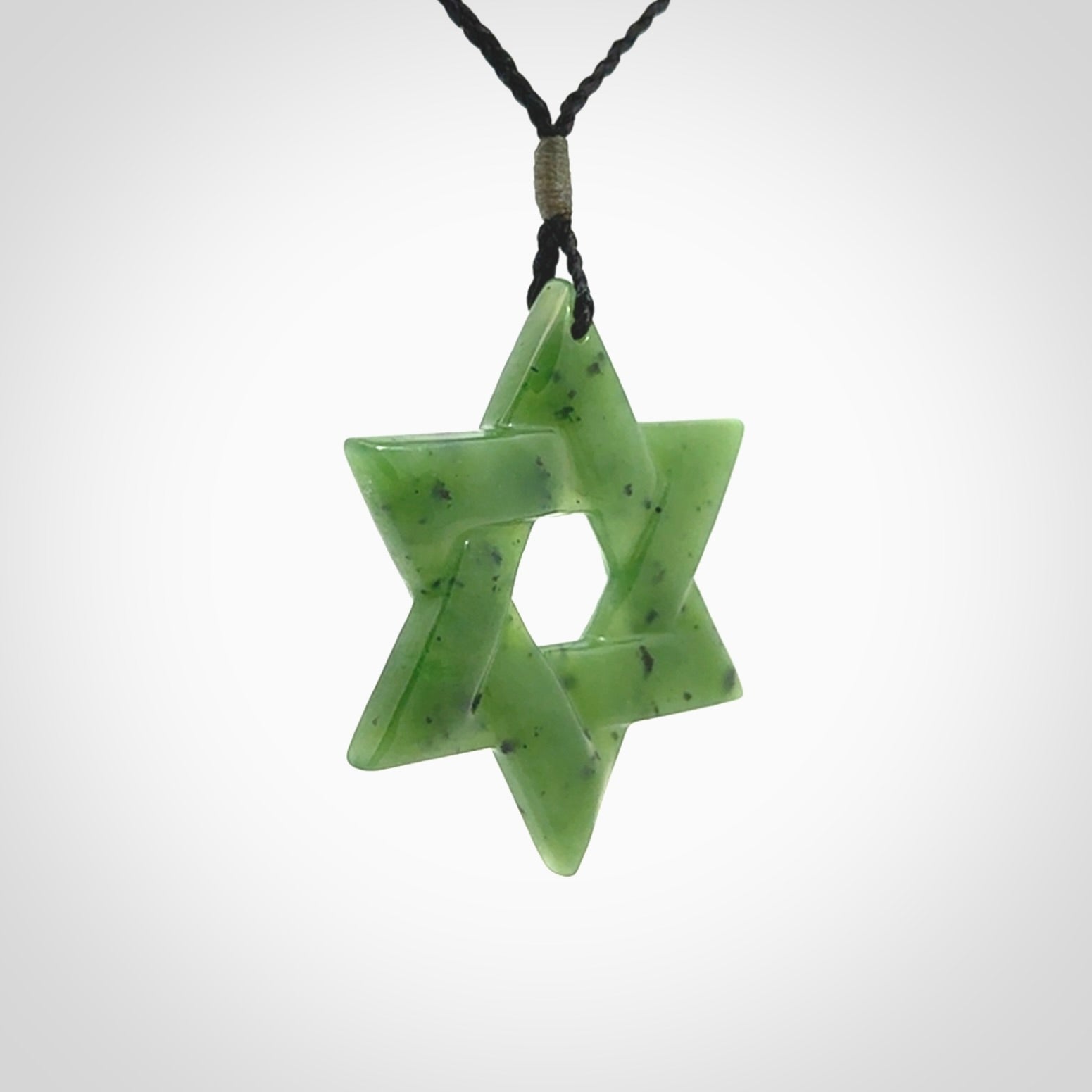 Star of David pendant hand carved from British Columbian Jade. Made by NZ Pacific and for sale worldwide. Postage is included in the price.
