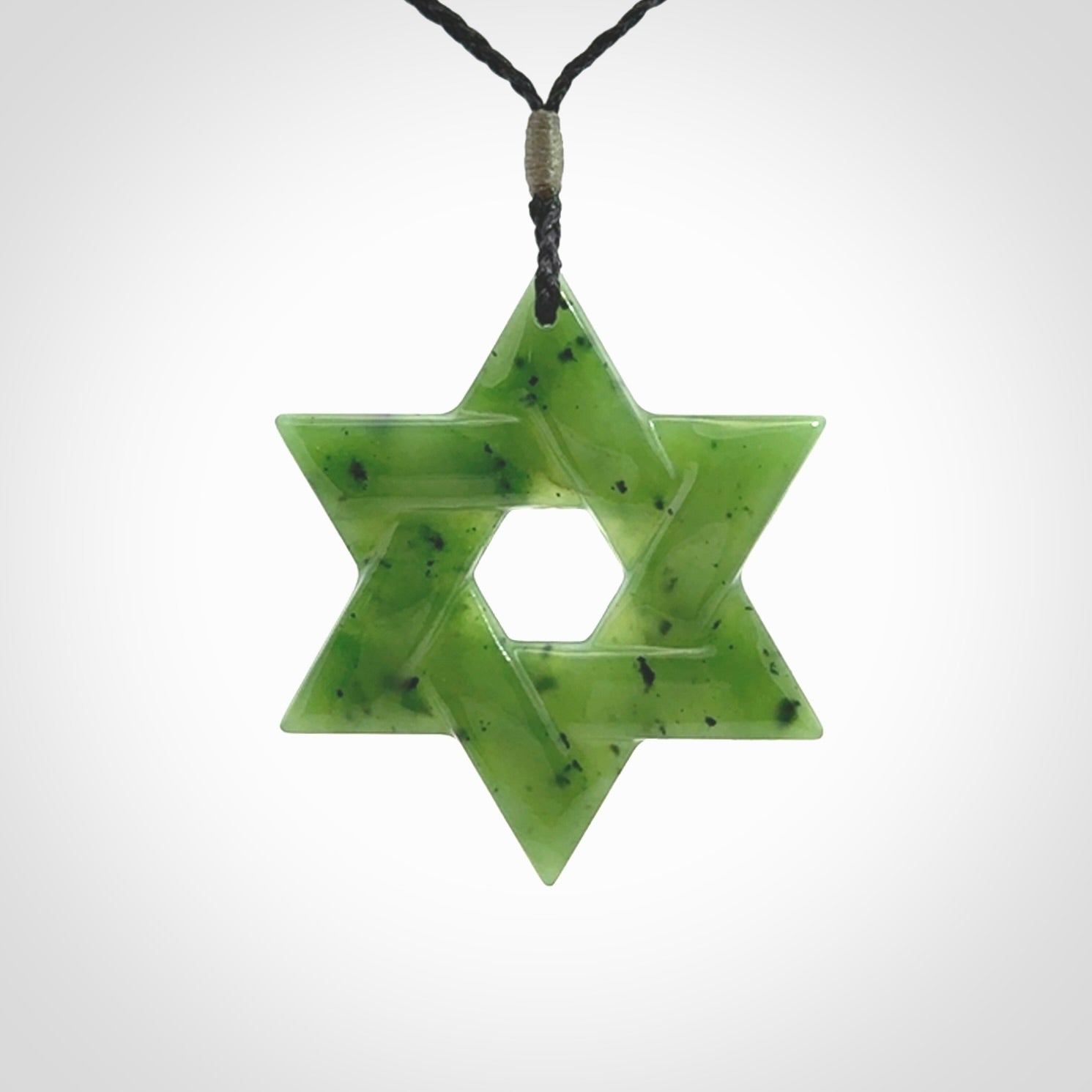 Star of David pendant hand carved from British Columbian Jade. Made by NZ Pacific and for sale worldwide. Postage is included in the price.