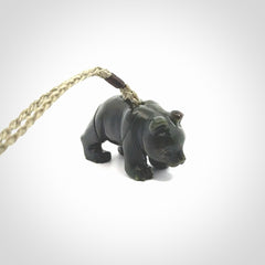This picture shows a pendant that we designed in New Zealand jade. It is a little green bear that has a walking stance and is carved in detail. A really attractive and eye-catching piece of handmade jewellery. The cord is hand plaited braid and the length can be adjusted.