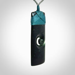 Hand made large New Zealand Tangiwai toki pendant. Hand carved in New Zealand by Graeme Wylie for NZ Pacific . Hand made jewellery. Unique large Jade Toki with adjustable length cord. Free shipping worldwide.
