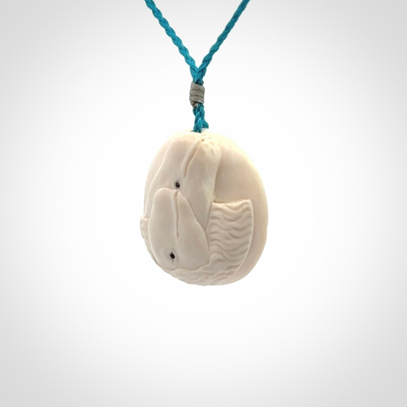 Hand carved woolly mammoth tusk beluga whale pendant