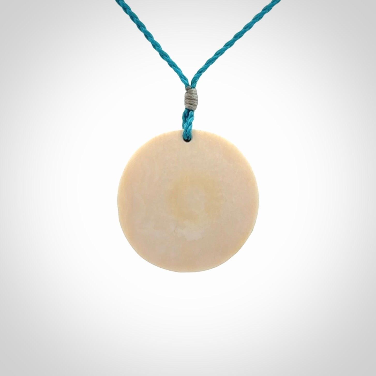 Hand carved woolly mammoth tusk beluga whale pendant