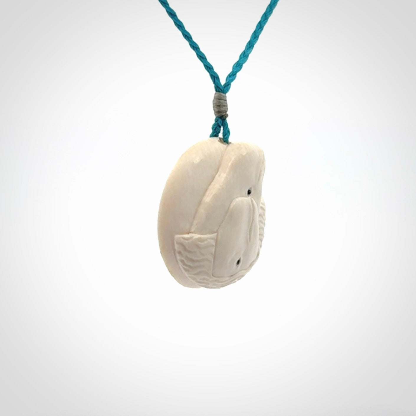 Hand carved woolly mammoth tusk beluga whale pendant