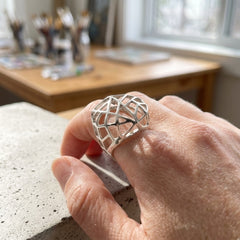 hand wearing ring