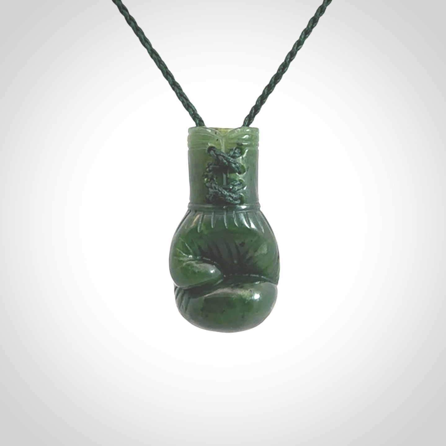 Hand carved British Columbian Jade boxing glove pendants