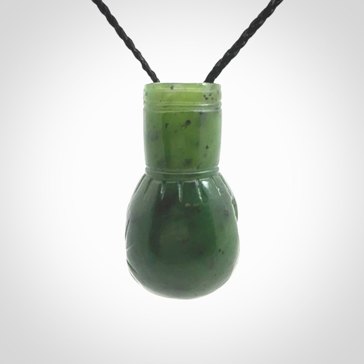 Hand carved boxing glove made from Jade. The cord is adjustable so that you can wear this where it suits you best. The cost of shipping worldwide is included in the price.