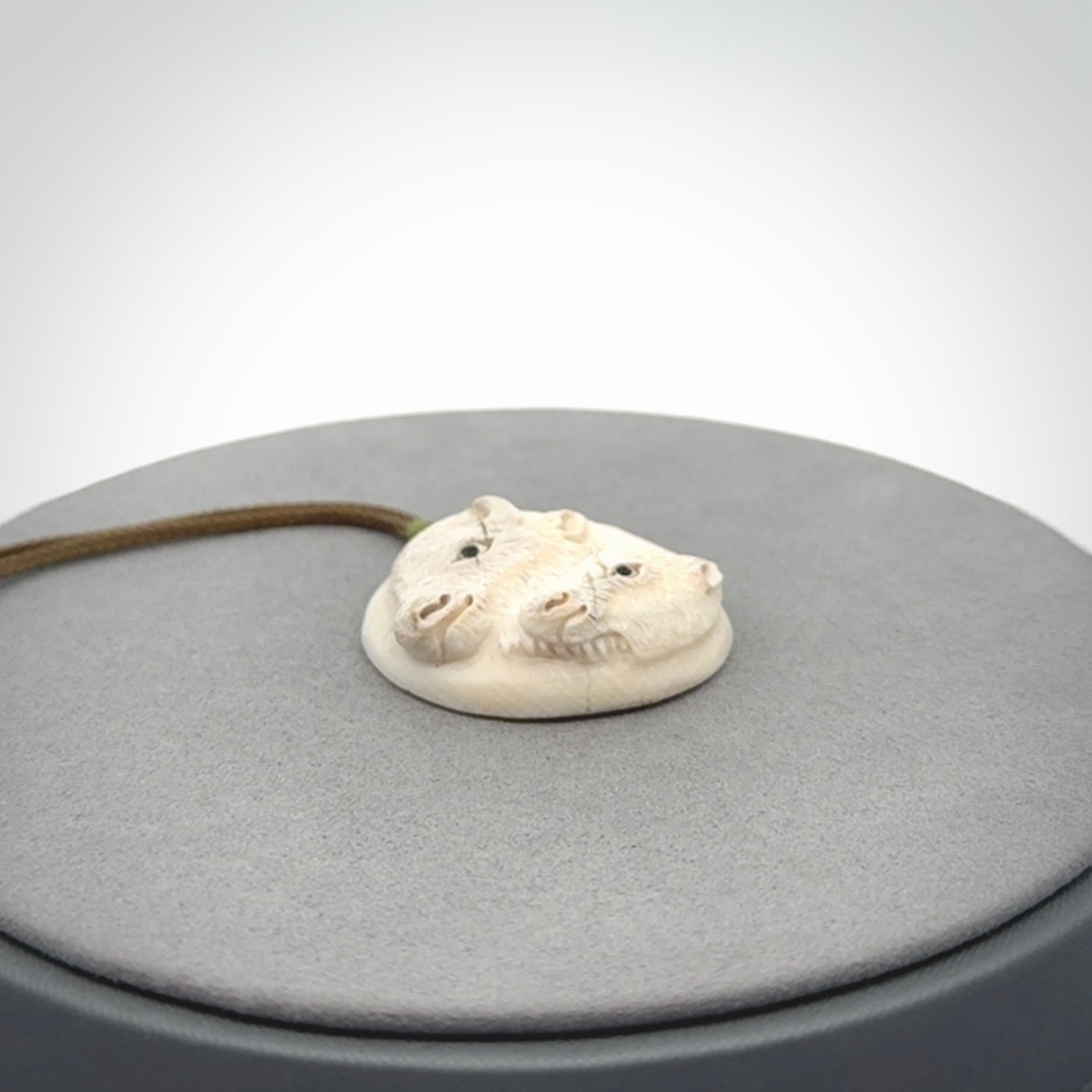 Bison pendant Hand Carved in Woolly Mammoth Tusk