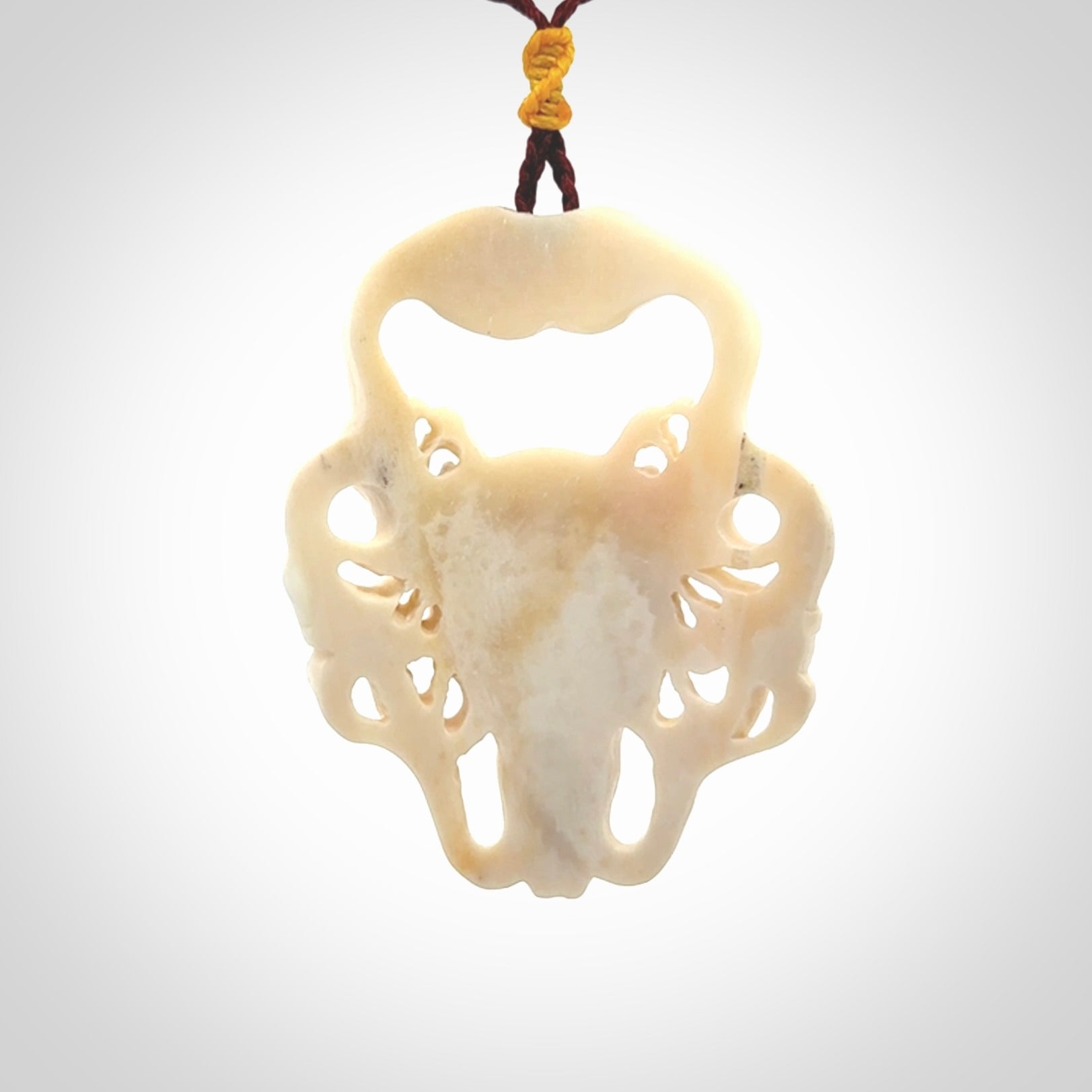 This is a hand carved contemporary bison bone skull pendant. This is a medium sized necklace and is a very unique, one only, pendant that is a piece for bison lovers.