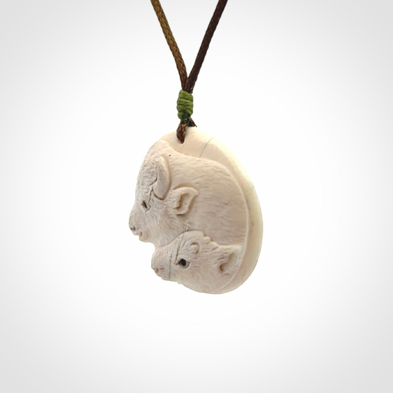 Bison pendant Hand Carved in Woolly Mammoth Tusk