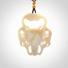 This is a hand carved contemporary bison bone skull pendant. This is a medium sized necklace and is a very unique, one only, pendant that is a piece for bison lovers.