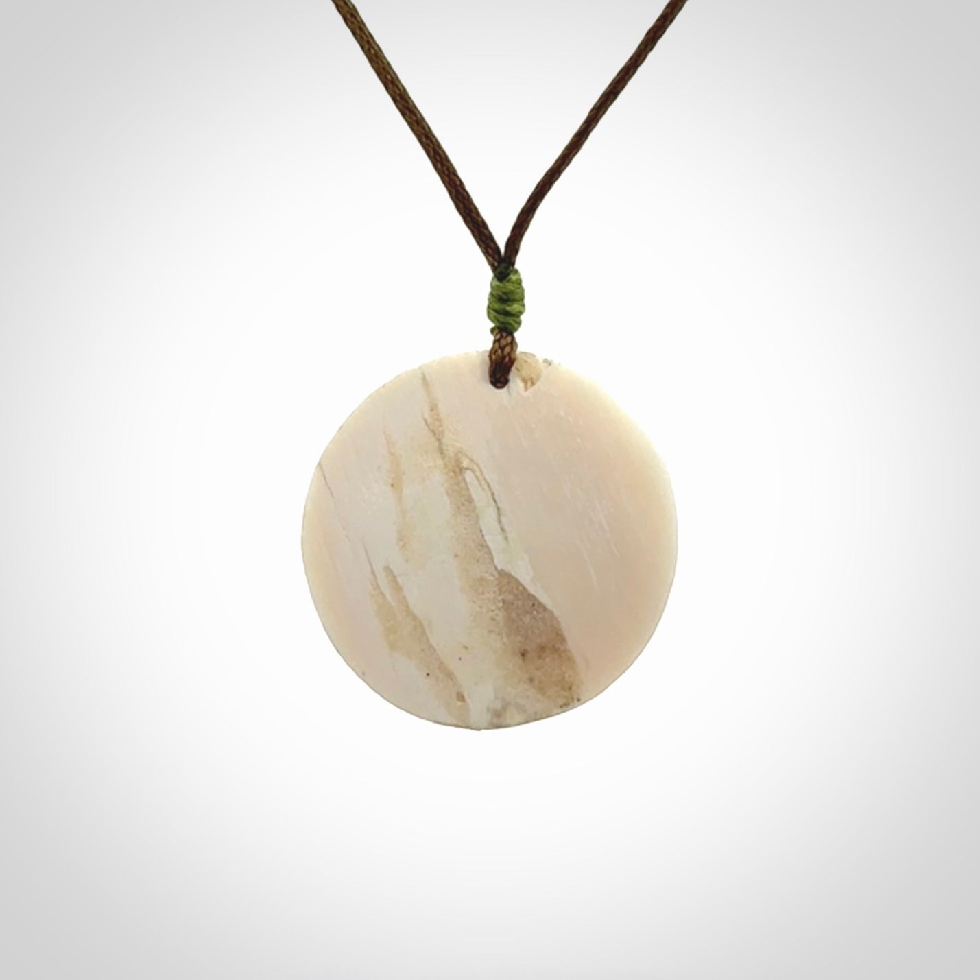 Bison pendant Hand Carved in Woolly Mammoth Tusk