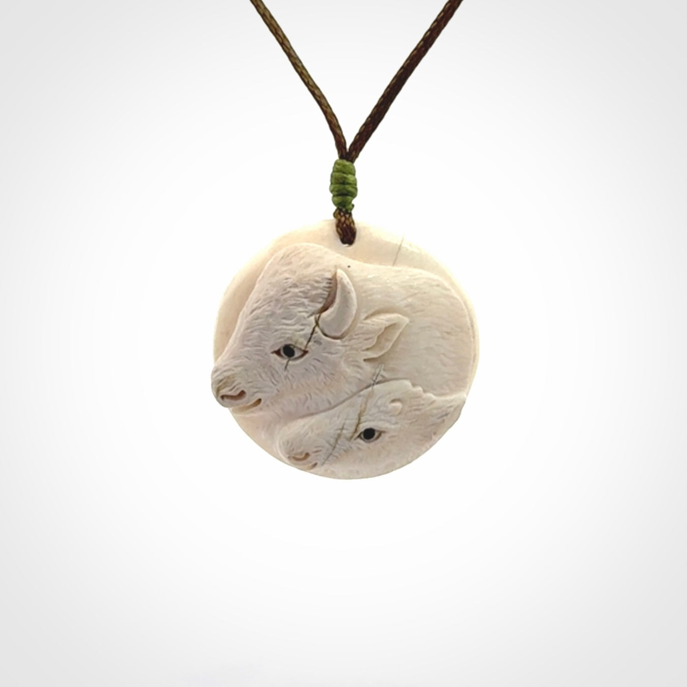 Bison pendant Hand Carved in Woolly Mammoth Tusk