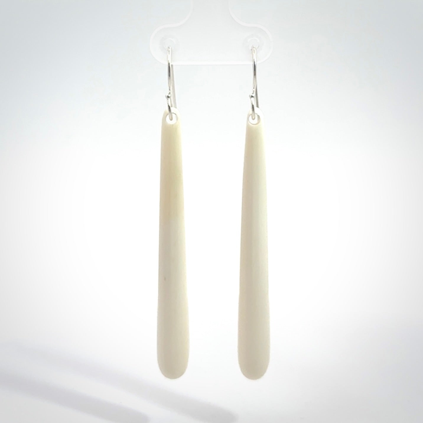Hand carved large sized, bone drop earrings. Hand made by Kristal Thompson. One only bone drop earrings. Real bone art to wear. Free Shipping worldwide