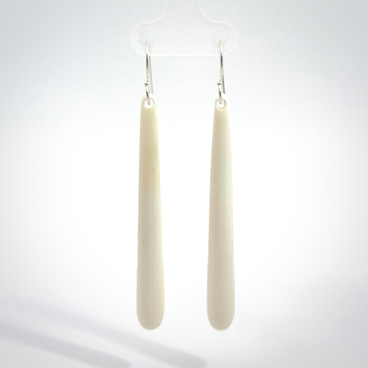 Hand carved large sized, bone drop earrings. Hand made by Kristal Thompson. One only bone drop earrings. Real bone art to wear. Free Shipping worldwide