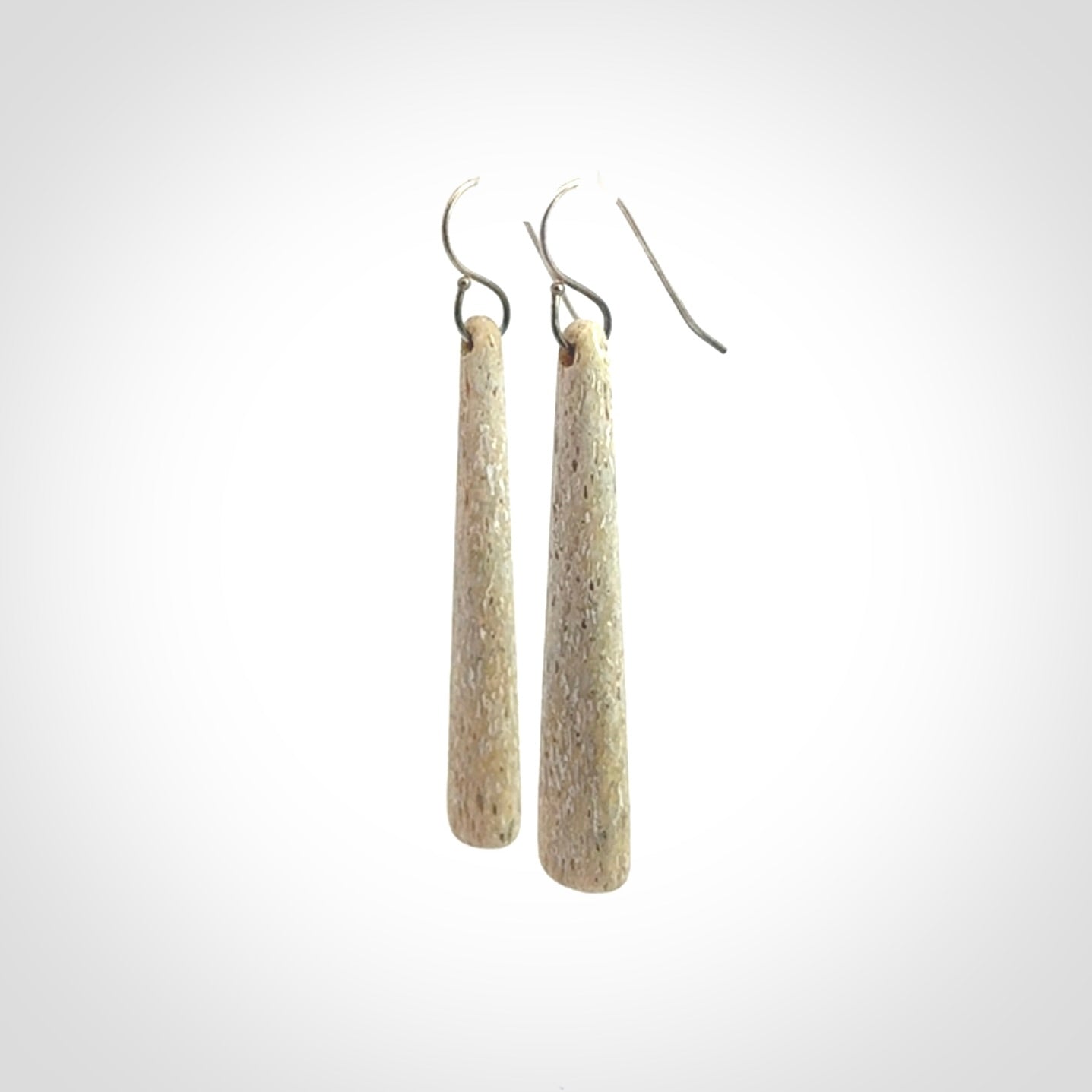 Hand carved large whalebone drop earrings hand made by Kristal Thompson. One only large whale bone drop earrings. Real whale bone art to wear. Free Shipping worldwide. One pair only, delivered in a kete pouch.
