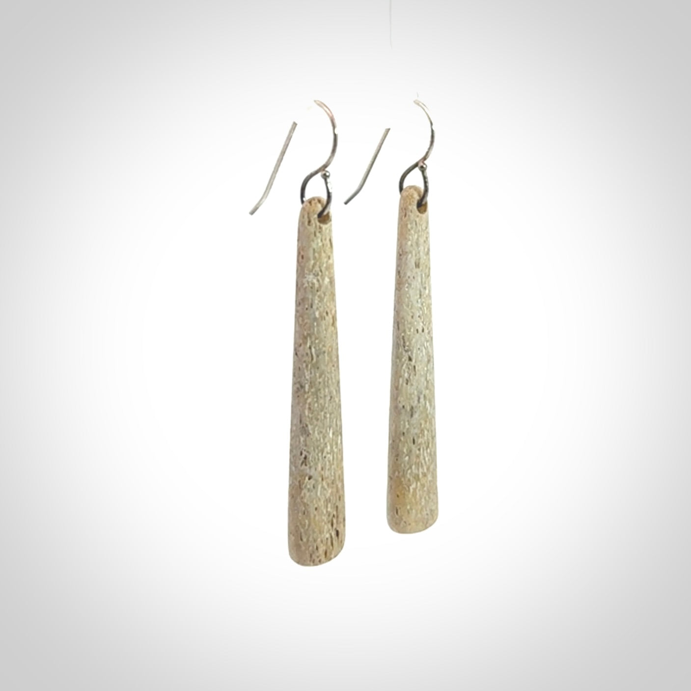Hand carved large whalebone drop earrings hand made by Kristal Thompson. One only large whale bone drop earrings. Real whale bone art to wear. Free Shipping worldwide. One pair only, delivered in a kete pouch.