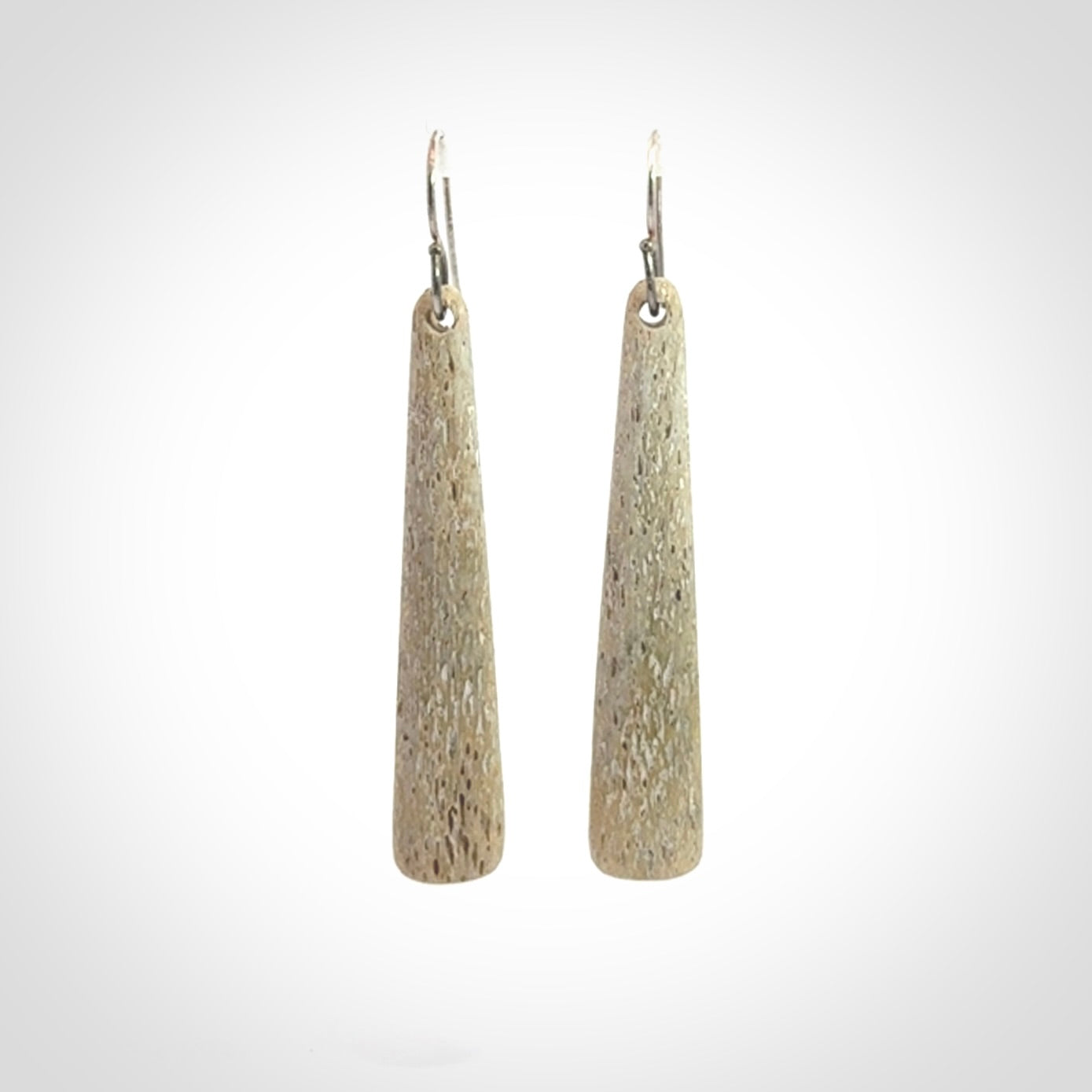 Hand carved large whalebone drop earrings hand made by Kristal Thompson. One only large whale bone drop earrings. Real whale bone art to wear. Free Shipping worldwide. One pair only, delivered in a kete pouch.