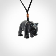 This picture shows a pendant that we designed in black jade. It is a little black bear that has a walking stance and is carved in detail. A really attractive and eye-catching piece of handmade jewellery. The cord is black and the length can be adjusted.