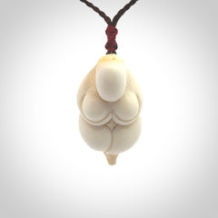 Hand carved large Blomi Goddess pendants carved from Deer Antler. Large deer antler bone carving of a female goddess. Unique are to wear. We provide these on adjustable cords and shipping is included in the price.