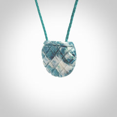 This is a handcrafted aotea stone pendant. This is a solid little work of art. We ship this worldwide for free and are happy to answer any questions that you may have about these or other products on our website.