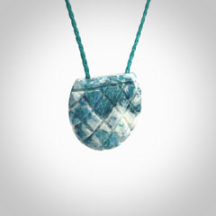 This is a handcrafted aotea stone pendant. This is a solid little work of art. We ship this worldwide for free and are happy to answer any questions that you may have about these or other products on our website.