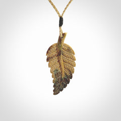 Hand carved blue Mammoth Tusk feather pendant with adjustable cord. Woolly Mammoth tusk feather necklace. Hand carved by NZ Pacific. Art to Wear.
