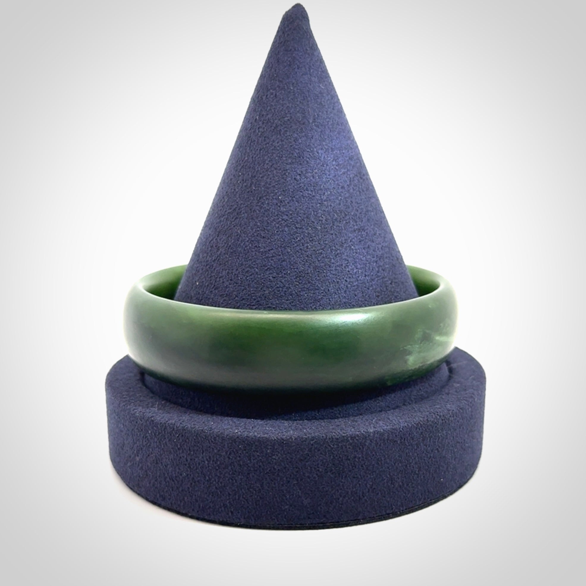 Hand carved New Zealand Jade bangle with matte finish, by Ric Moor. This is a spectacular one off, bracelet hand made in New Zealand from gorgeous Jade. Unique art to wear, delivered in a woven kete pouch. Real New Zealand Jade. Outstanding craftsmanship by New Zealand Master Carver Ric Moor.
