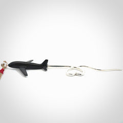 Hand carved plane and heart pendant from Australian Black Jade with Sterling Silver. This is a very cool piece of jewellery, hand made by NZ Pacific. We provide this with an adjustable cord. Free Postage Worldwide.