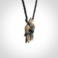 A Wonderful Bronze Manuka Pendant with New Zealand Jade insert