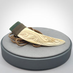 Hand carved boars tusk and jade pendant