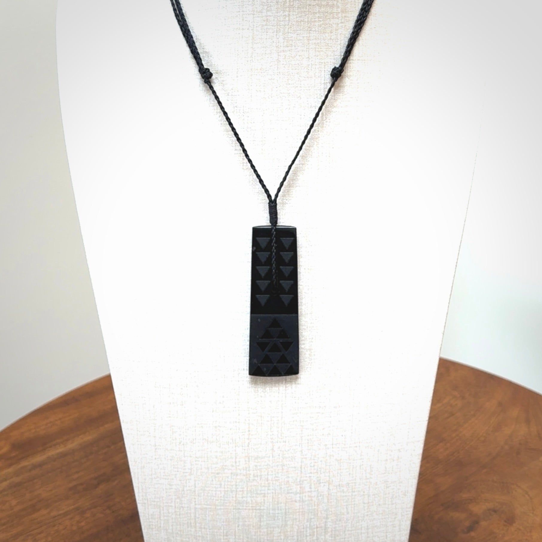 Hand made New Zealand Tangiwai toki with engraving pendant. Hand carved in New Zealand by Kerry Thompson. Unique Jade Toki with adjustable cord.