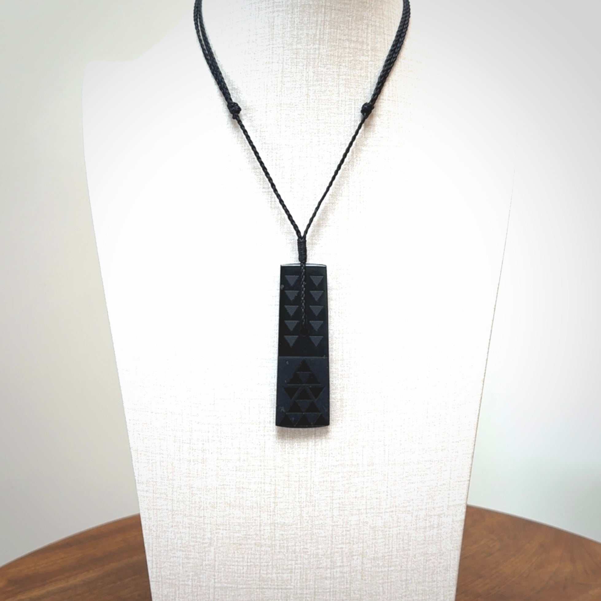 Hand made New Zealand Tangiwai toki with engraving pendant. Hand carved in New Zealand by Kerry Thompson. Unique Jade Toki with adjustable cord.
