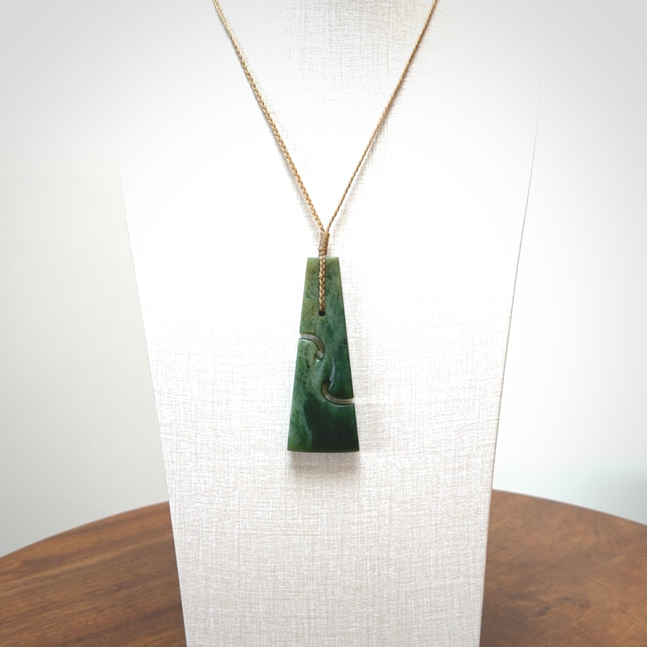 Hand made New Zealand jade toki with double koru pendant. Hand carved in New Zealand by Kerry Thompson. 