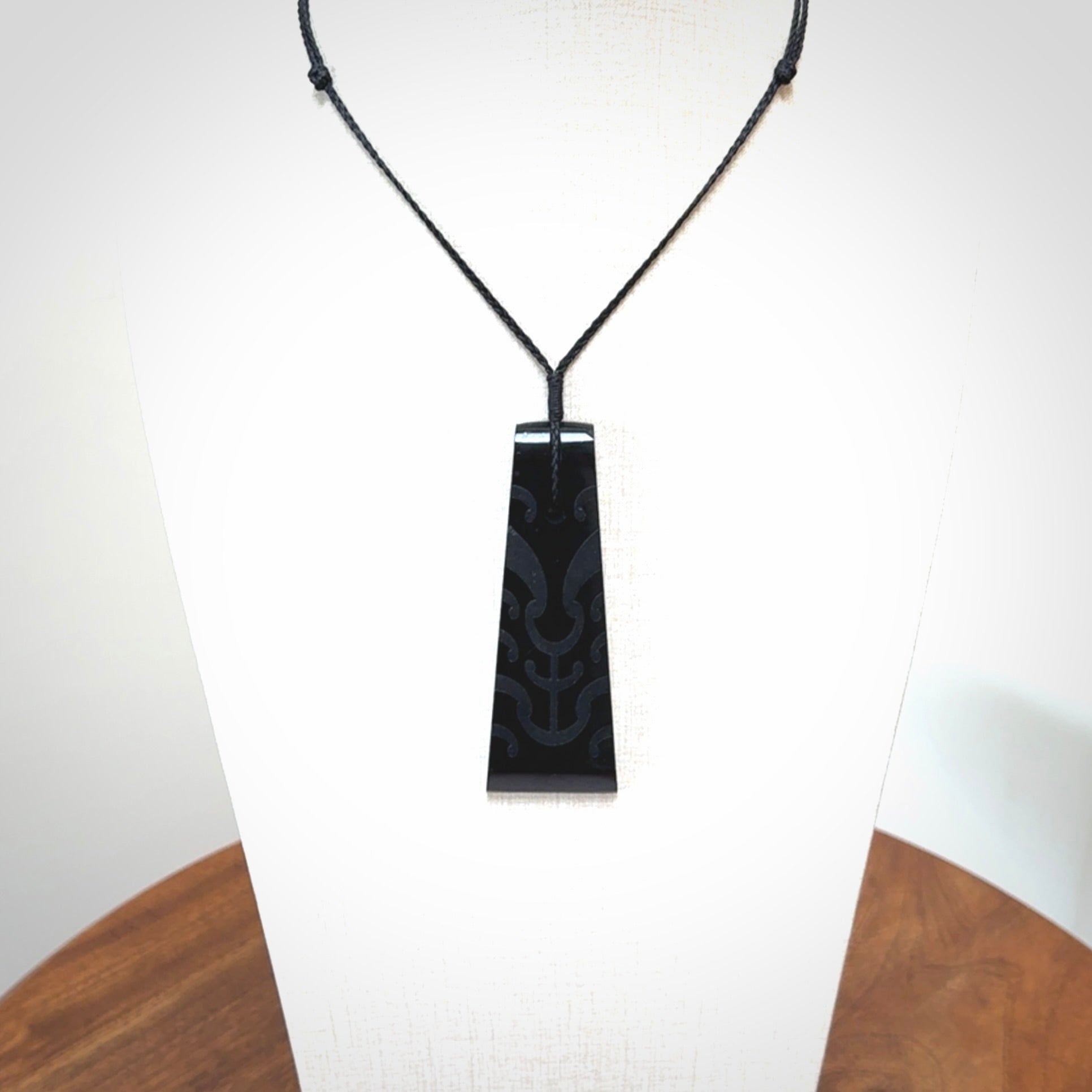 Hand made large New Zealand Tangiwai toki with koru pendant. Hand carved in New Zealand by Kerry Thompson. Unique large Jade Toki with adjustable cord.