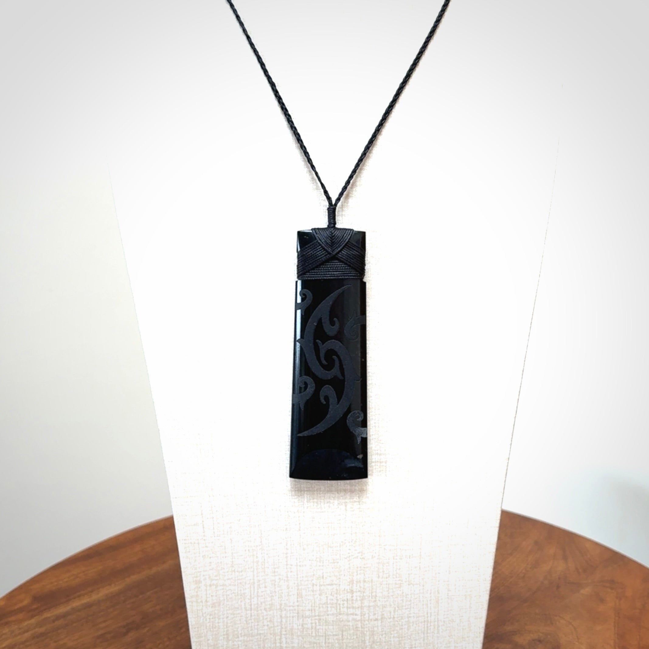 Hand made large New Zealand Tangiwai toki with koru pendant. Hand carved in New Zealand by Kerry Thompson. Unique large Jade Toki with adjustable cord.