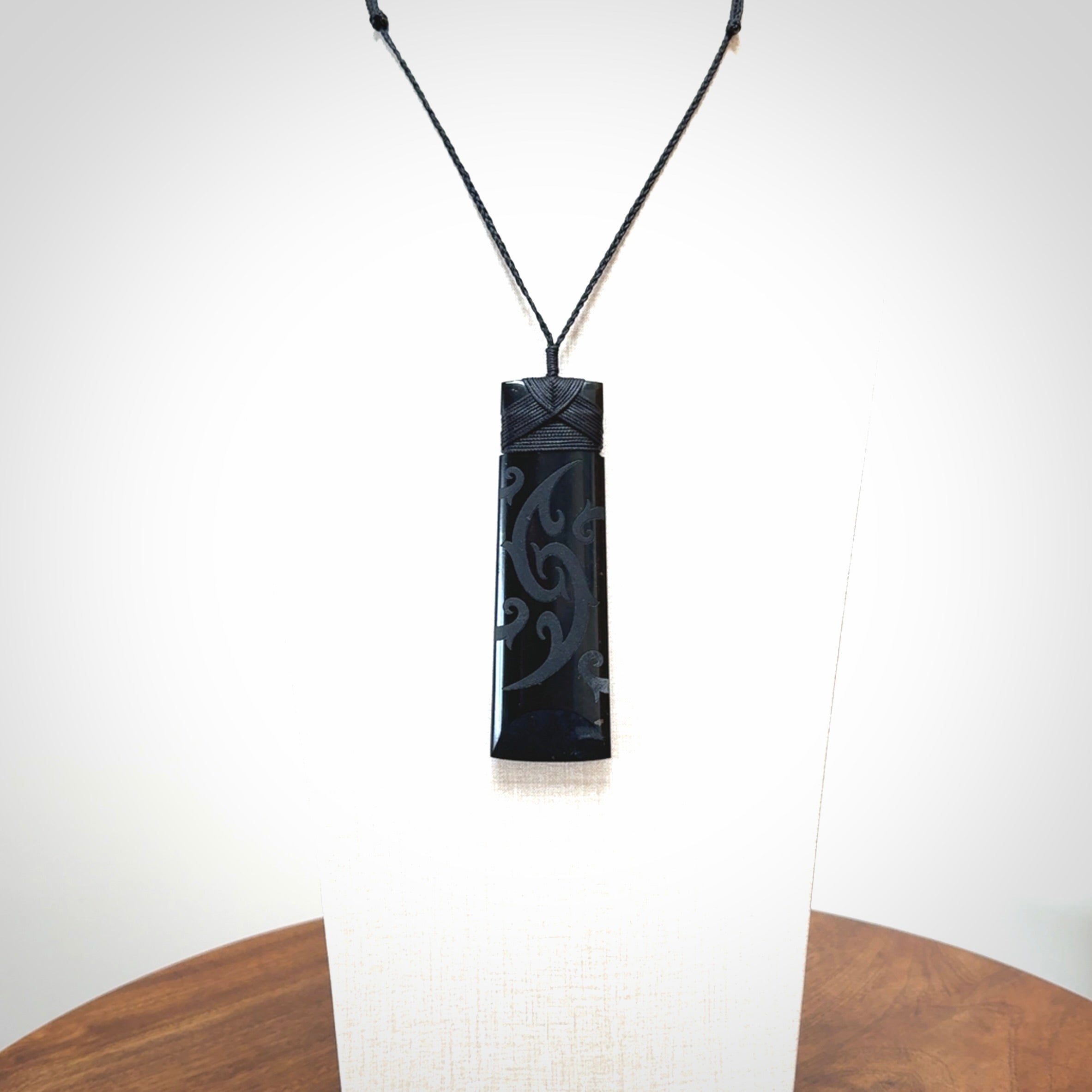 Hand made large New Zealand Tangiwai toki with koru pendant. Hand carved in New Zealand by Kerry Thompson. Unique large Jade Toki with adjustable cord.