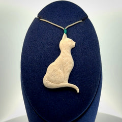 Hand carved bone cat pendant