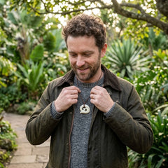 Man wearing bone pendant