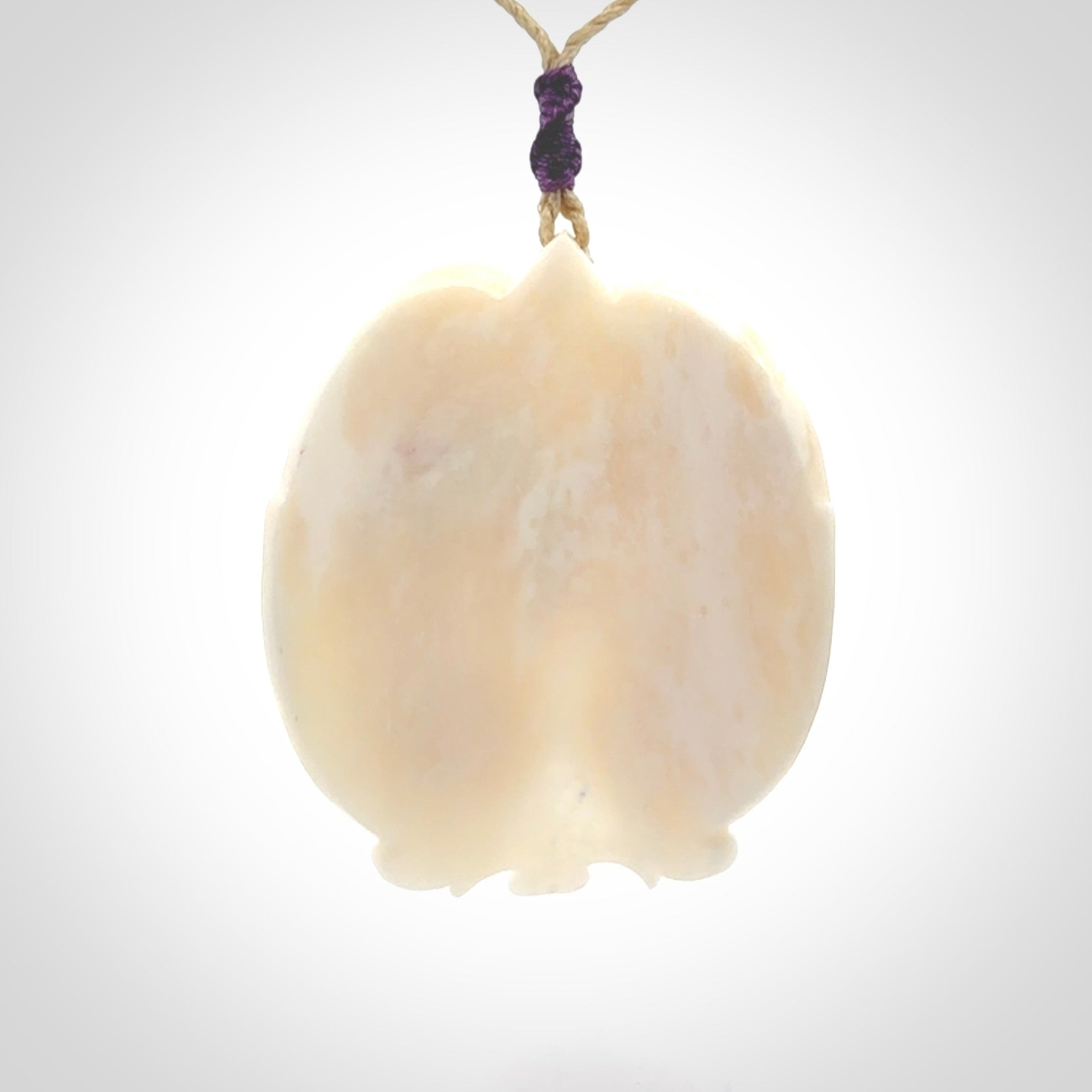 This is a contemporary large pendant carved in bone. Hand carved and provided with an adjustable cord. Twins in womb pendant.