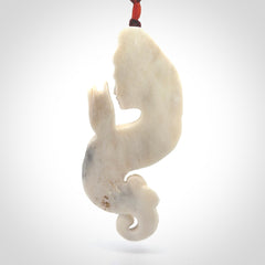 This is a contemporary large female pendant carved in bone. Hand carved and provided with an adjustable cord. Woman with shuni mudra hand gesture pendant.