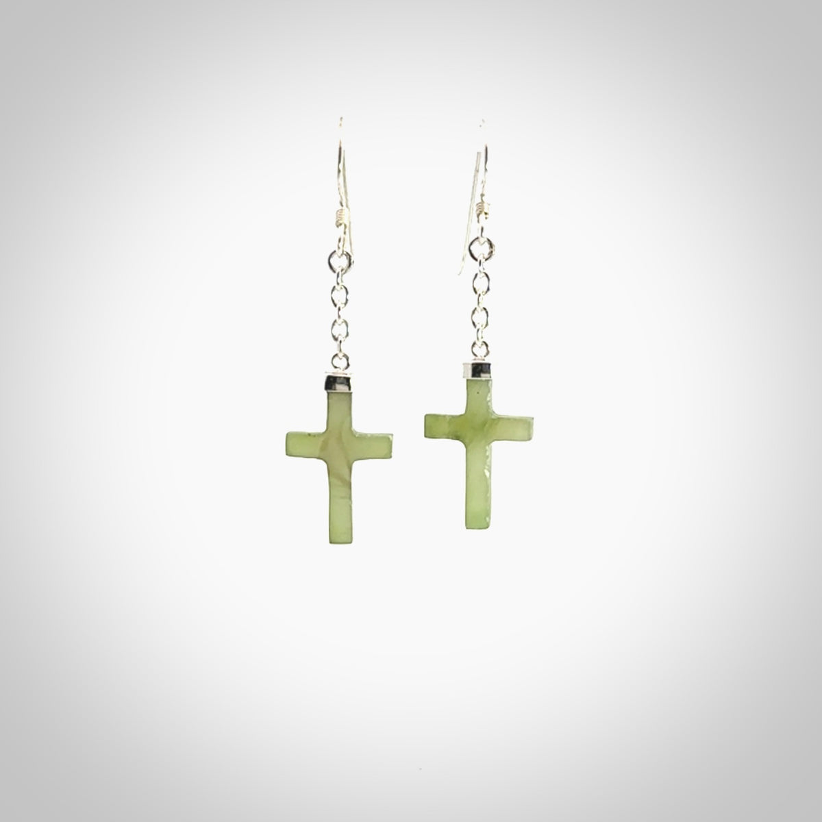 Hand carved small Nephrite jade cross earrings. Made by NZ Pacific from real jade. Online jewellery for sale online by NZ Pacific.