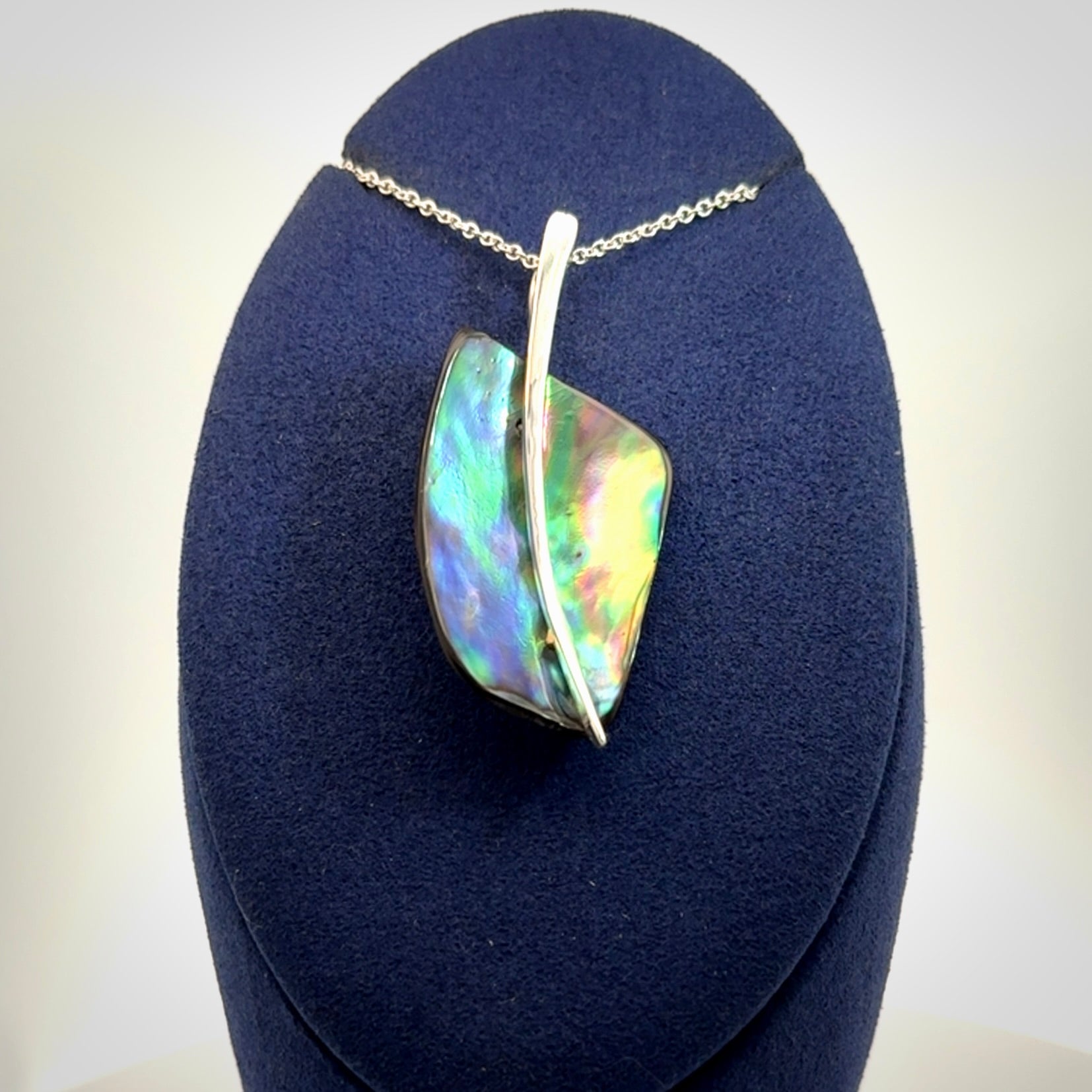Paua shell with sterling silver pendant