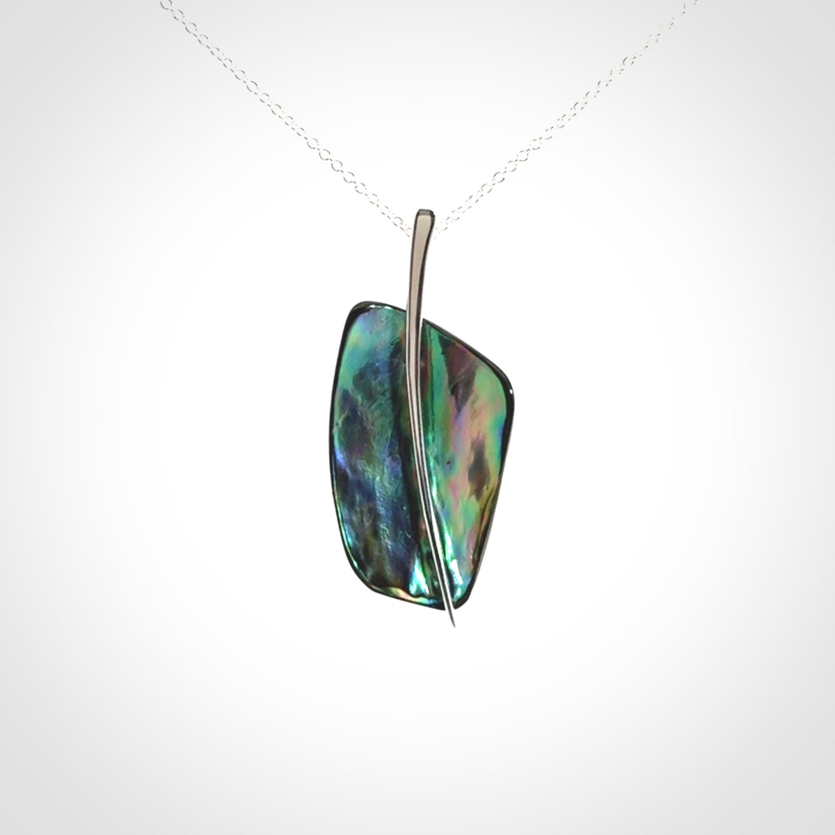 Paua shell with sterling silver pendant