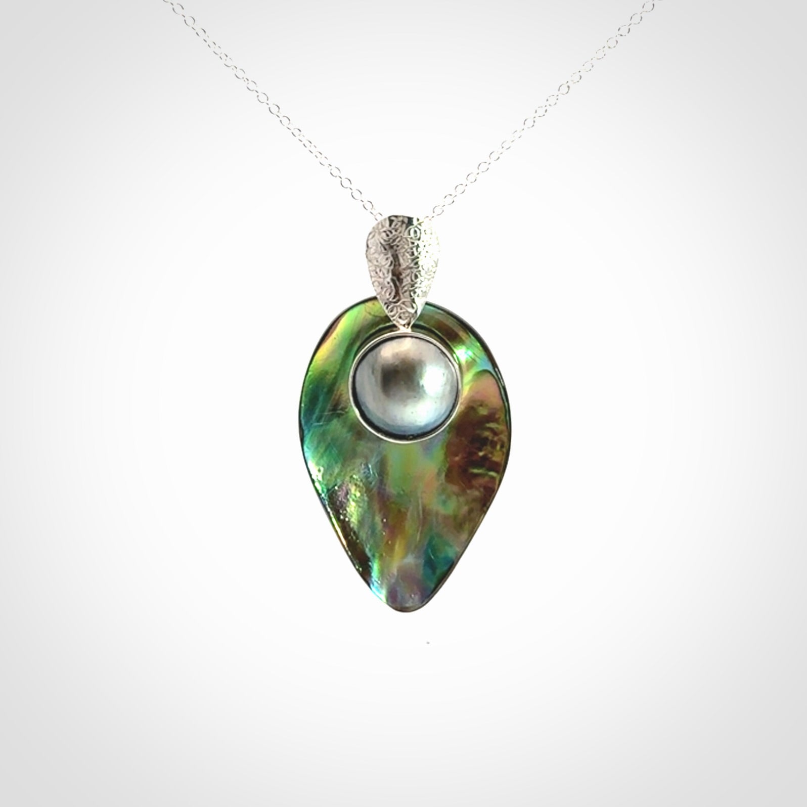 Hand Crafted Pāua Shell, Black Mabe Pearl and Sterling Silver pendant